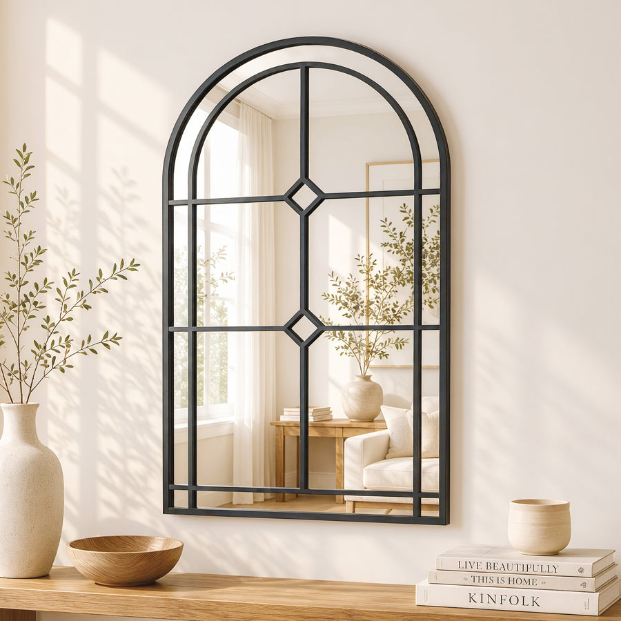Grida Arched WindowPane Mirror in a softly lit room